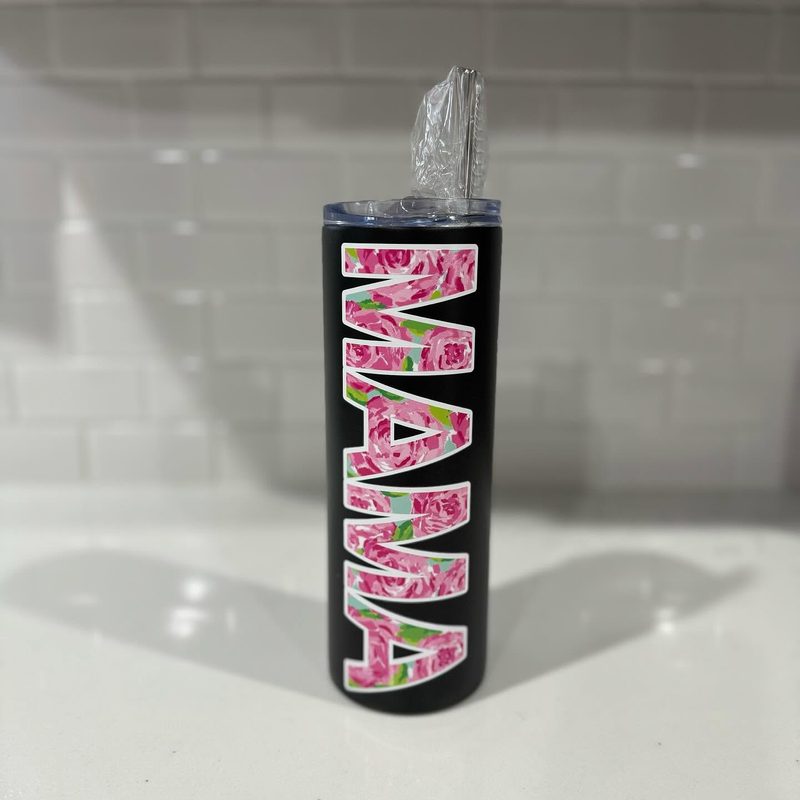 Black skinny tumbler with “MAMA” in pink floral lettering